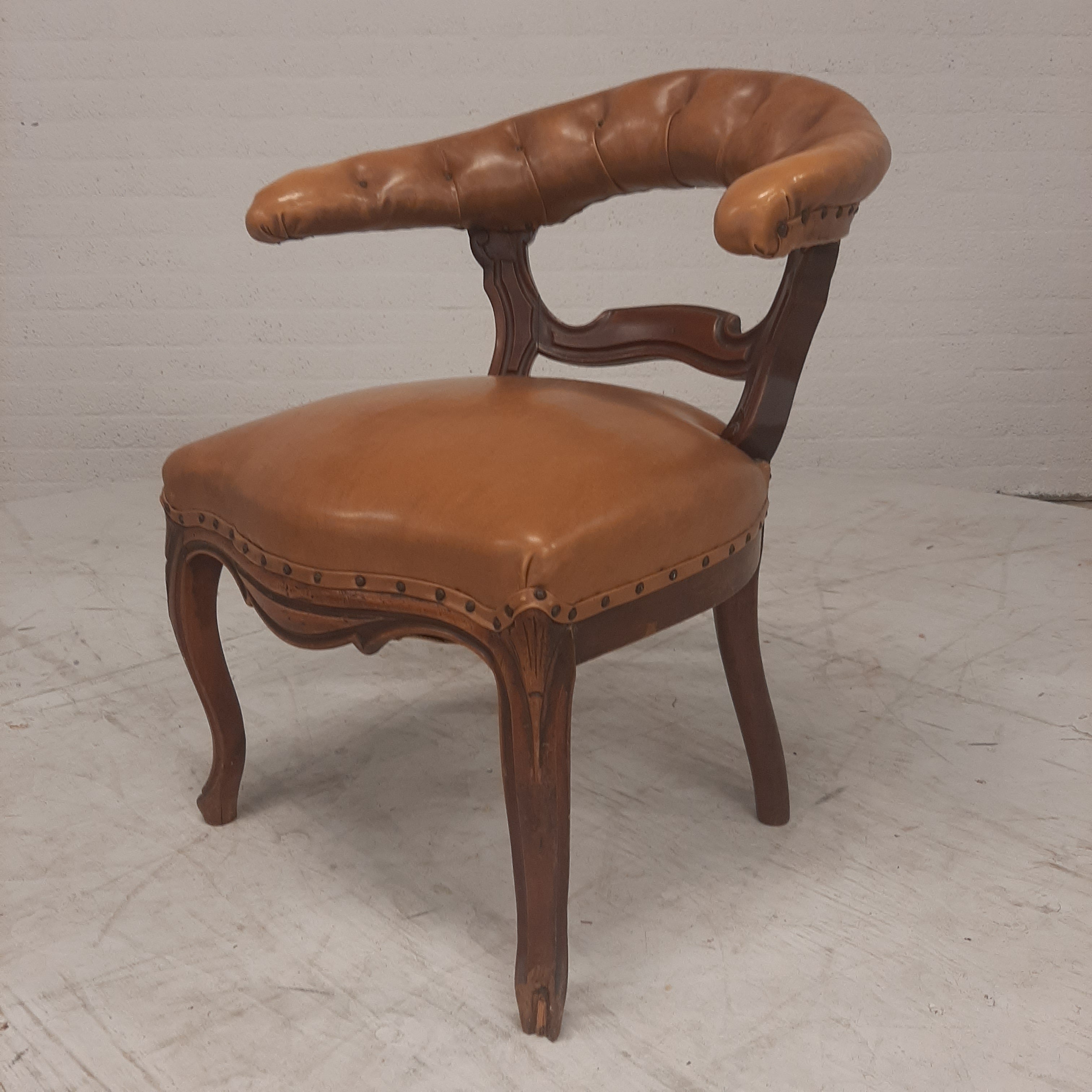 Antiek lederen fauteuil