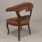 Antiek lederen fauteuil