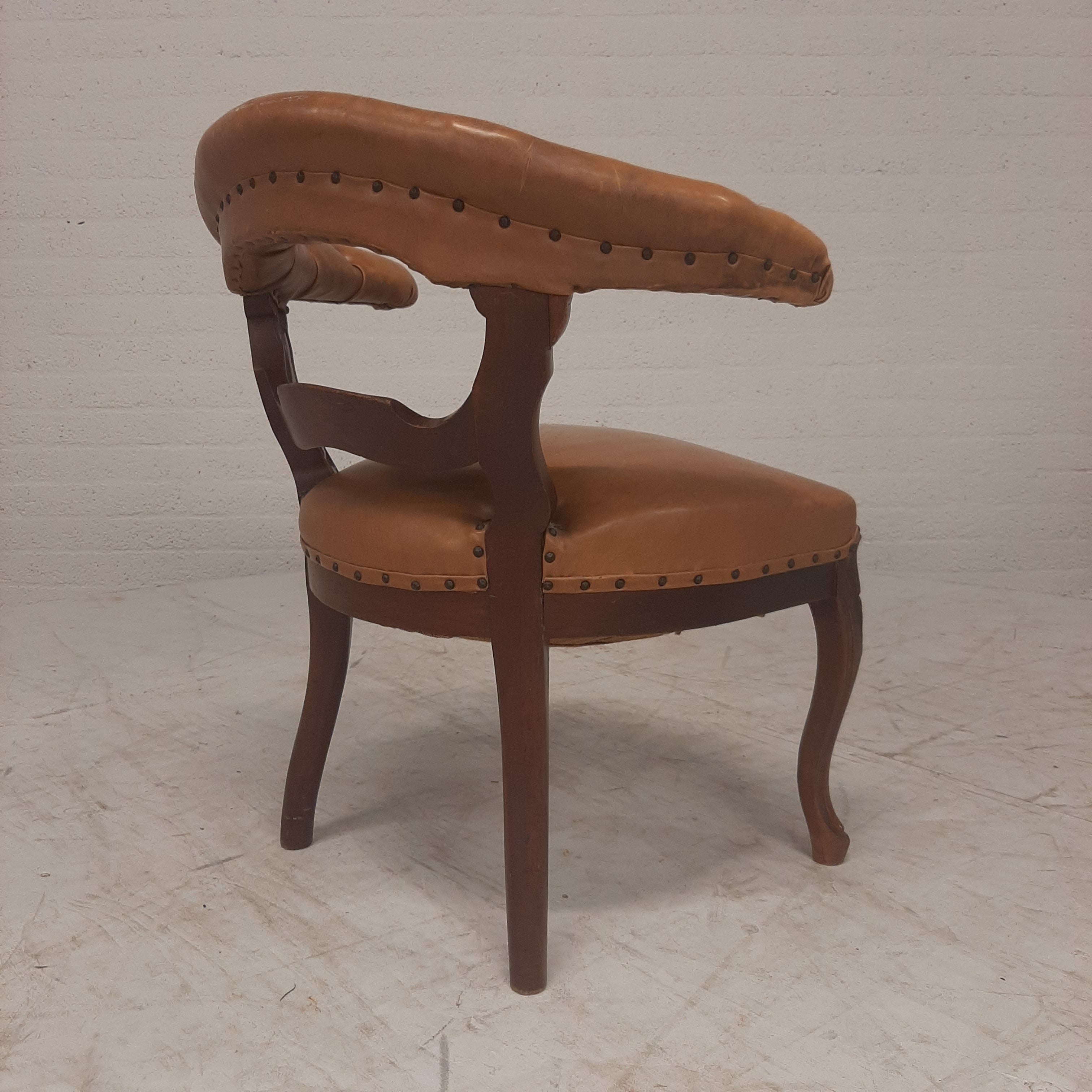 Antiek lederen fauteuil