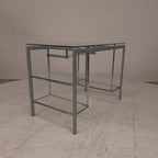 Glazen bureau op buizenframe