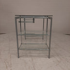 Glazen bureau op buizenframe