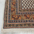Perzisch tapijt in rood/beige tinten