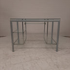 Glazen bureau op buizenframe