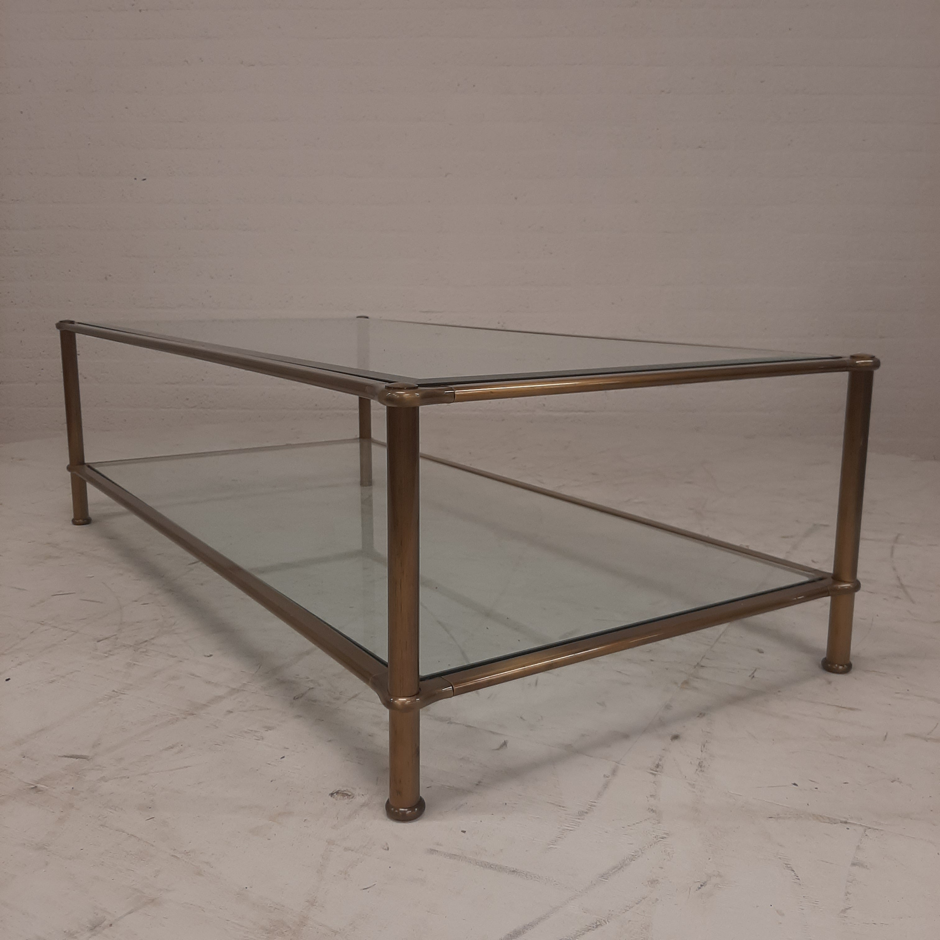 Messing salontafel met twee glasplaten