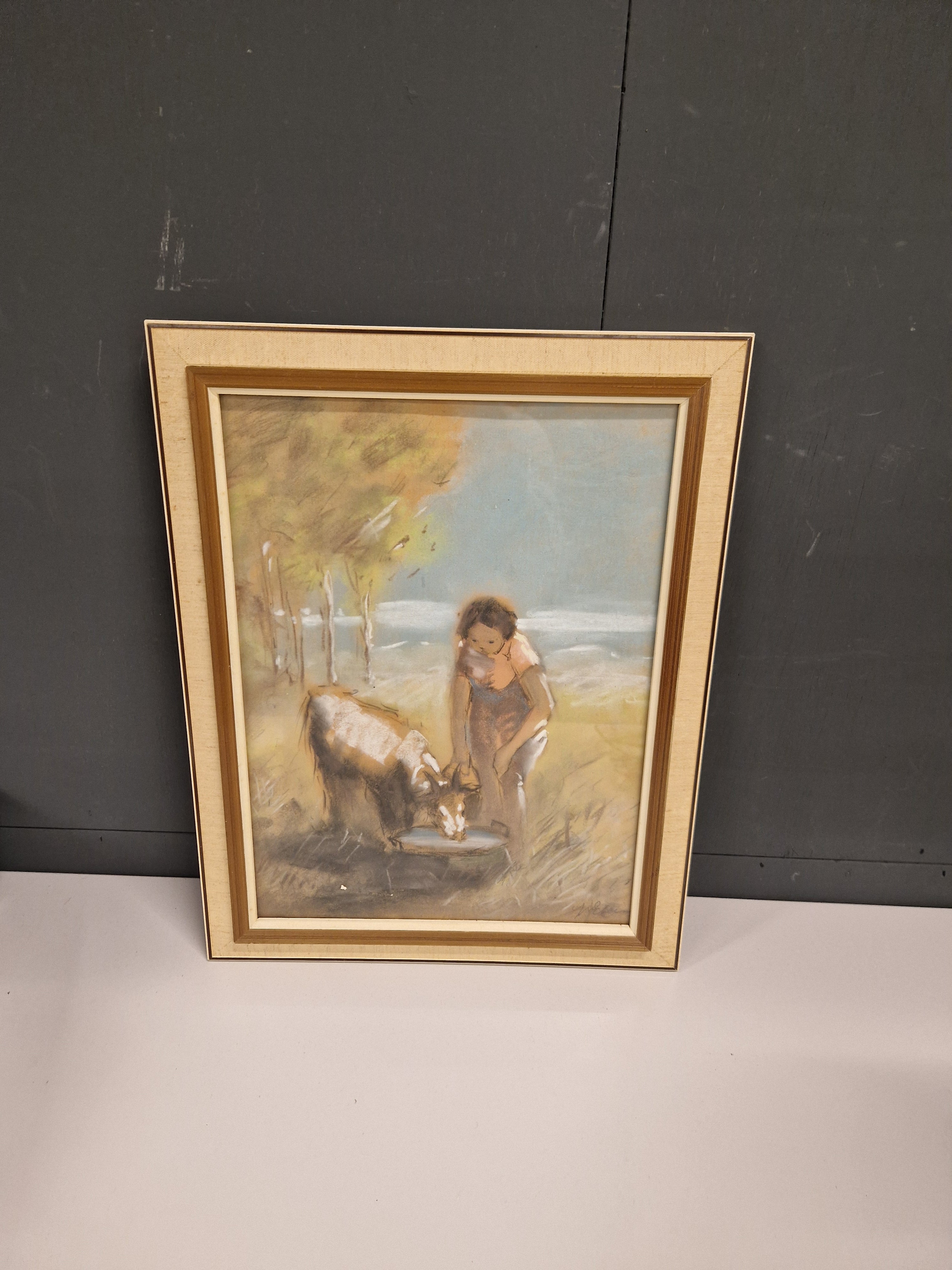 Gesigneerde pastel, vrouw bij geitje