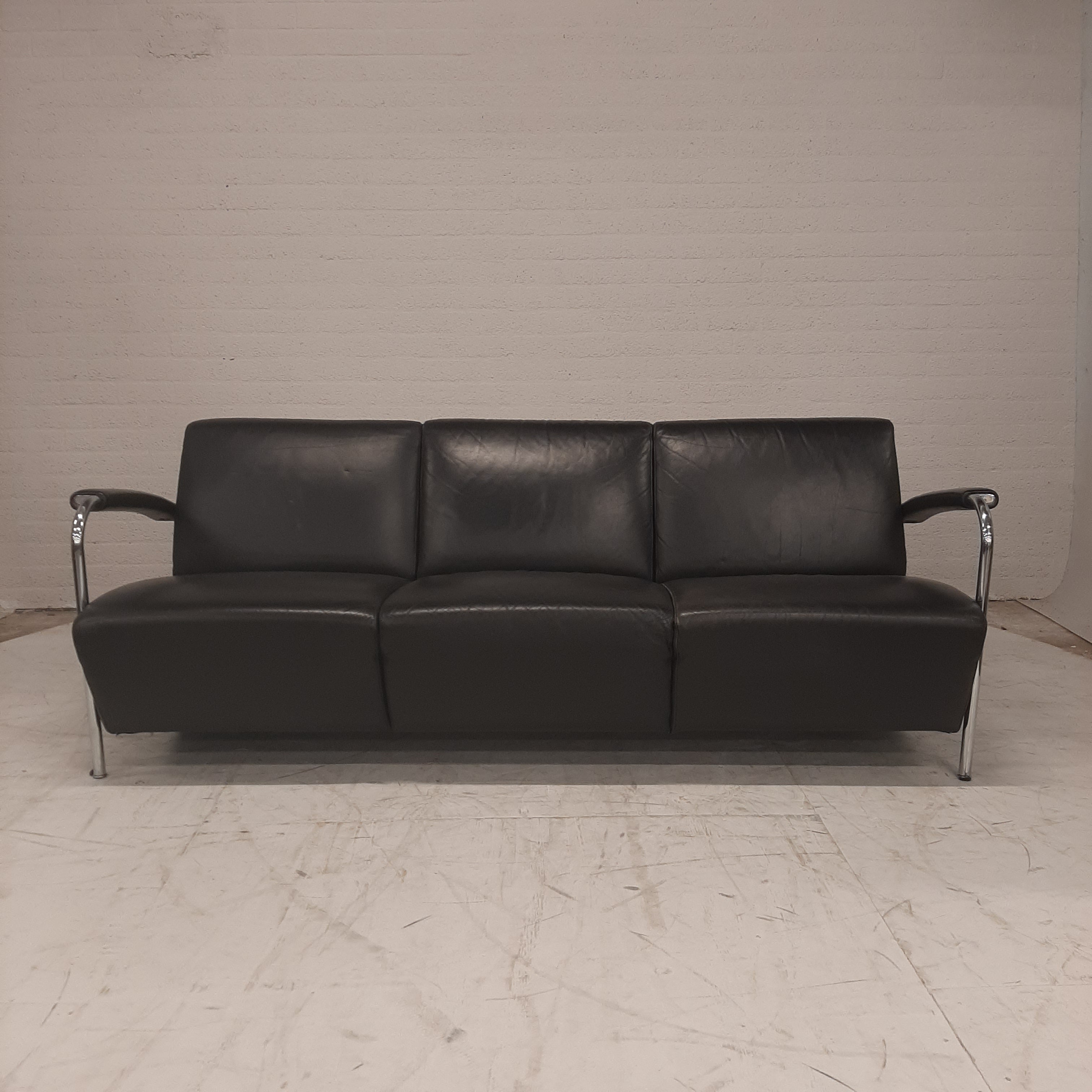 Leolux zwart leren bank rvs