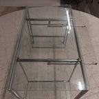 Glazen bureau op buizenframe