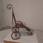Antieke poppenwagen