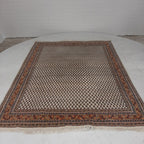 Perzisch tapijt in rood/beige tinten
