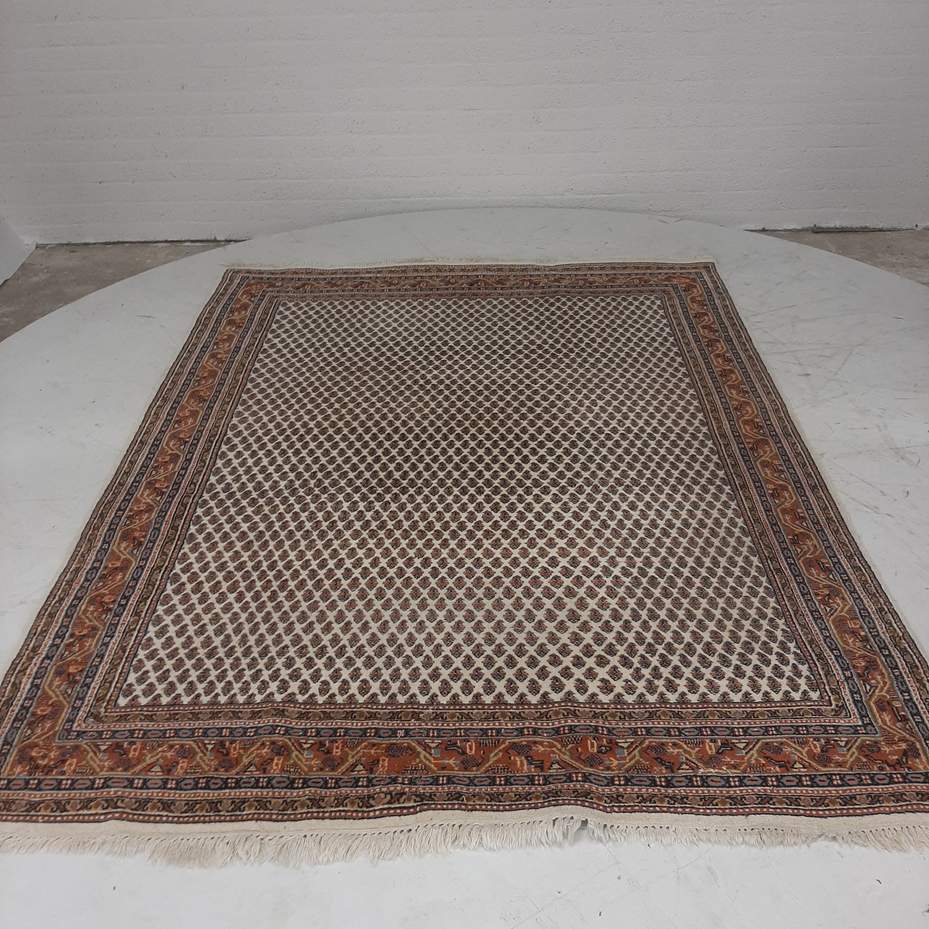 Perzisch tapijt in rood/beige tinten