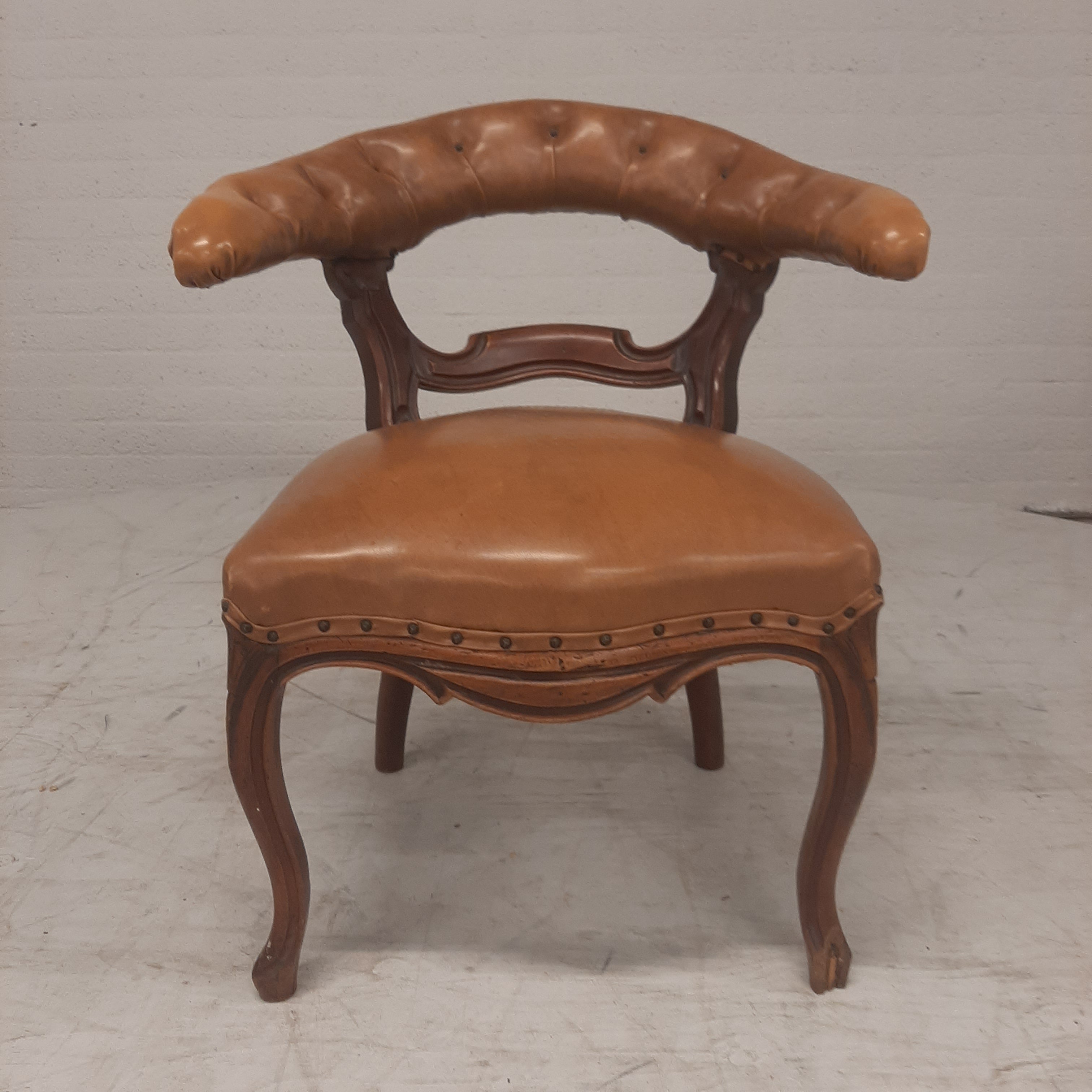 Antiek lederen fauteuil